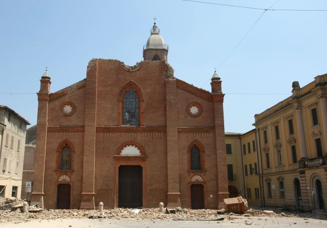The cathedral of Mirandola is badly damaged, with large parts of it scattered across the ground. Police tape is strung across several areas of the town to prevent more casualties.