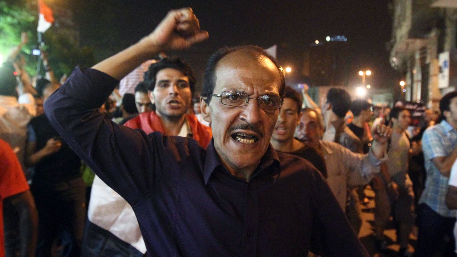 An Egyptian man shouts slogans during a demonstration Monday after the first round of elections in Cairo.