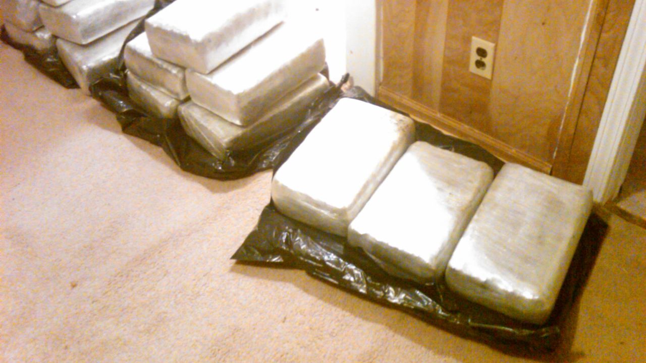 At the house in an unassuming High Point neighborhood, authorities found trash bags with 115 pounds of marijuana.