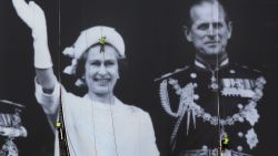 A giant photograph of Queen Elizabeth II and The Duke of Edinburgh is erected on a building on The River Thames on May 25.