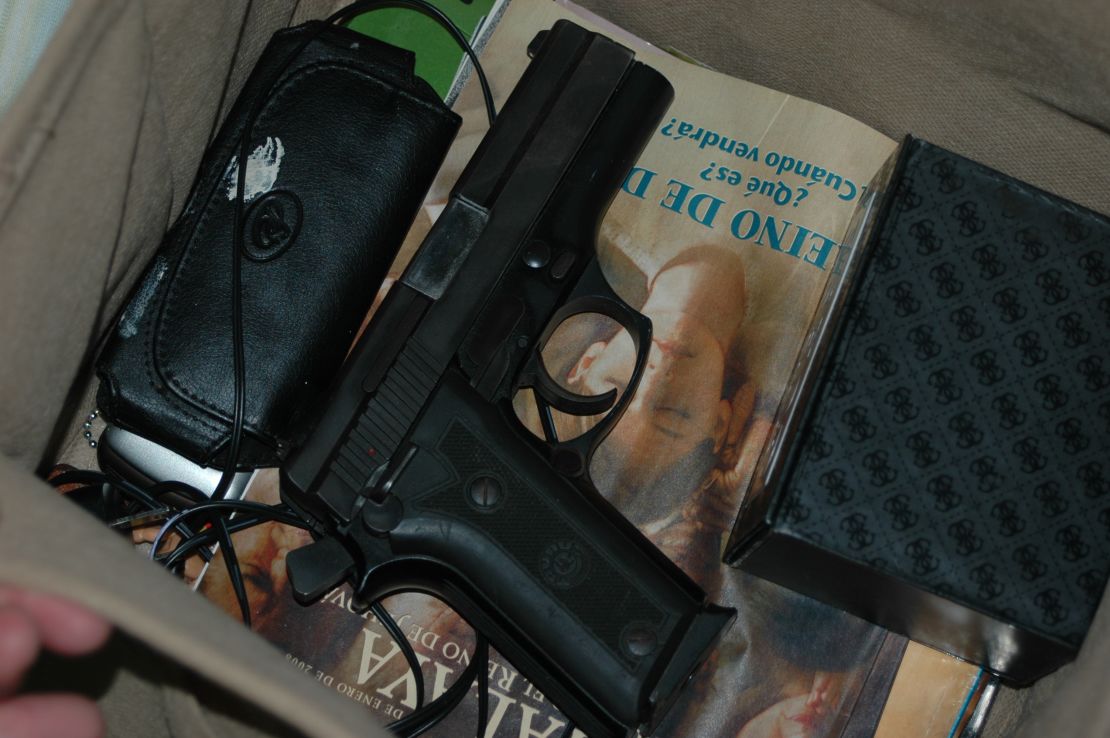 To agents' dismay, there was also a loaded handgun -- with its hammer cocked -- found during the search of the trailer.