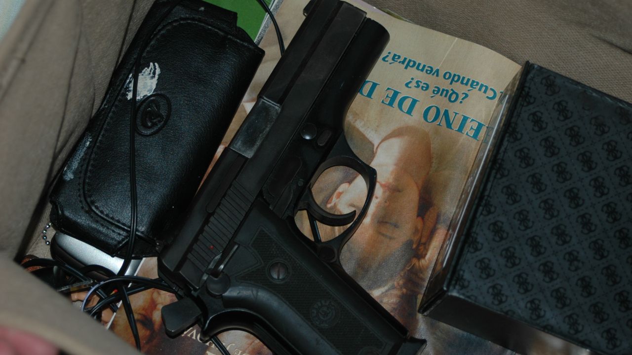 To agents' dismay, there was also a loaded handgun -- with its hammer cocked -- found during the search of the trailer.
