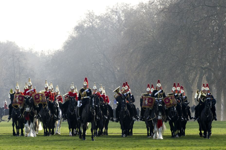 Members of the Household Cavalry Mounted Regiment parade on their horses during the Major General's inspection at Hyde Park in central London, on March 28, 2012 which they must pass to take part in state ceremonial activities. 