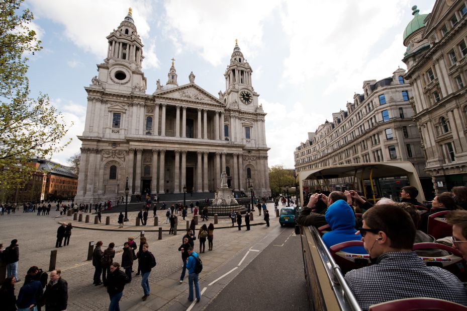 Tourists admire the view of Saint Paul's Cathedral from an open-top bus. The queen will visit the church on the morning of June 5 for the national Service of Thanksgiving before the procession and flypast at Buckingham Palace.