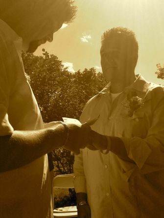 Kevin Haubrick, left, met his husband Mike online in 2009. It quickly became clear to Mike that Kevin was "the one" when he saw Kevin interact with his daughter, Elizabeth. The pair wed at a bed and breakfast in Arlington, Vermont, the following year in the presence of friends who helped Kevin create his online profile.