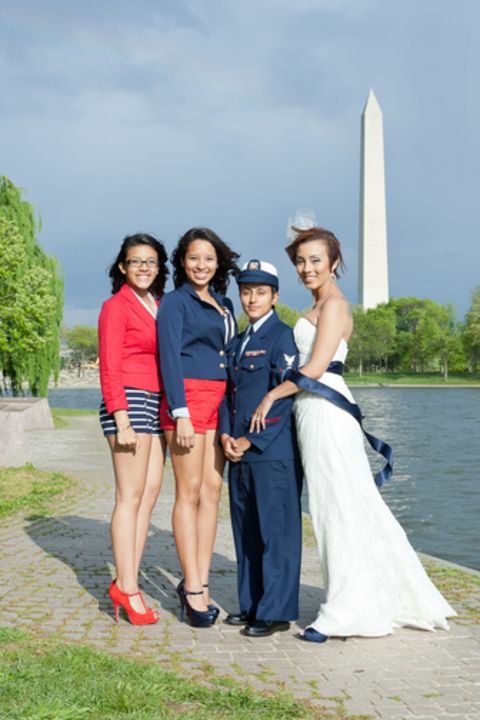 iReporter Valezka Taylor decided to adopt a sailor theme so her mate, Sami, could wear her Coast Guard uniform. They were inspired to get married after "don't ask, don't tell" was repealed, but it took an extra nudge from her teenage daughter to set the wheels in motion. Valezka's daughter and her aunt were bridesmaids; they wore red and blue to match the sailor theme.