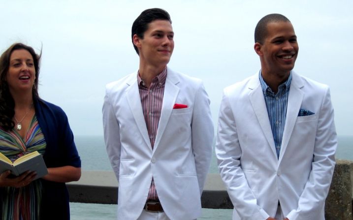 iReporter Alex Rhinehart, center, and Tony O'Brian held their wedding ceremony in a San Francisco park in May 2011, though same-sex marriage was not legal in California at the time. The pair led their guests to the summit of a cliff for the ceremony in lieu of a traditional wedding march -- using the spot to represent their union: "a place so old and solid with such a promising view of the horizon beyond."