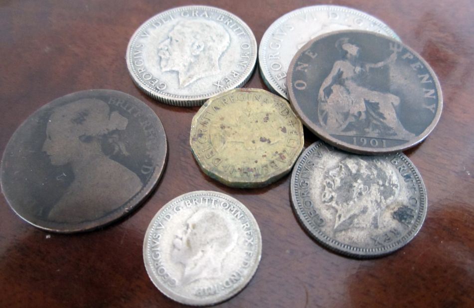 UK call boxes of 1952 took coins from the pre-decimal era. Some coins from the reign of Queen Elizabeth II's ancestors were still in circulation into the early 1970s.