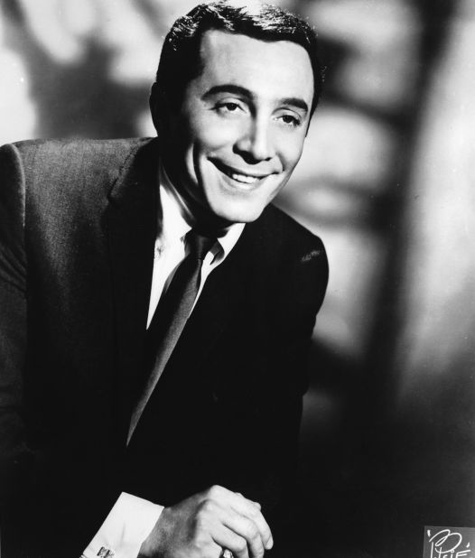 In the era before Elvis Presley, crooners like Al Martino were popular. He had a hit in the UK in 1952 with "Here in my heart."