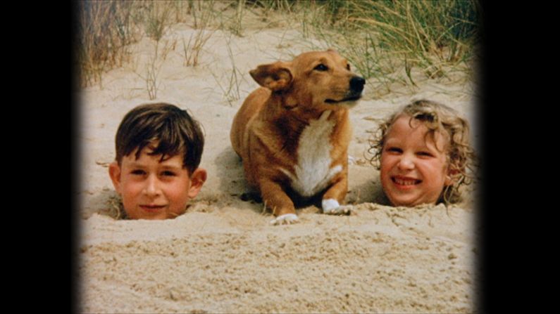 Prince Charles and Princess Anne in the sand at Holkham Beach during the summer of 1957.