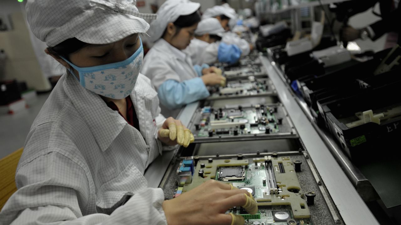 Foxconn disputes reports student interns are forced by schools to work on assembly lines.