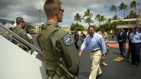 U.S. Secretary of Defense Leon Panetta boards his plane at Hickam Air Force Base in Hawaii on Thursday.