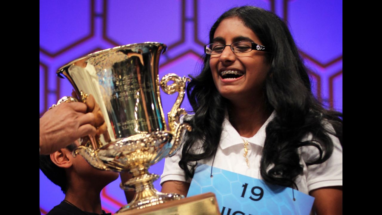 Snigdha Nandipati holds the trophy after winning the 2012 Scripps National Spelling Bee on Thursday.