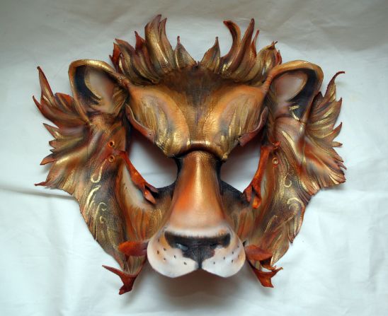 Jolene Schafer of Rapid City, South Dakota, designed this mask, as well as other animal masks. She said, "I was intrigued by the animal sigils of the royal houses. The lion, wolf and dragon represent and seem to influence the behavioral traits and actions of the individuals from each house."
