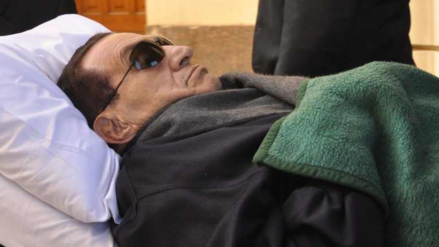 Ousted President Hosni Mubarak spent much of the time on a mobile bed during his trial.