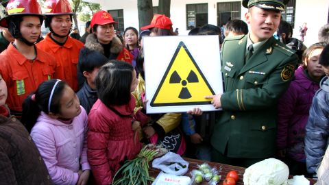 Chinese students learn about radiation awareness during a class at a school in Hanshan, east China's Anhui province on March 17, 2011.