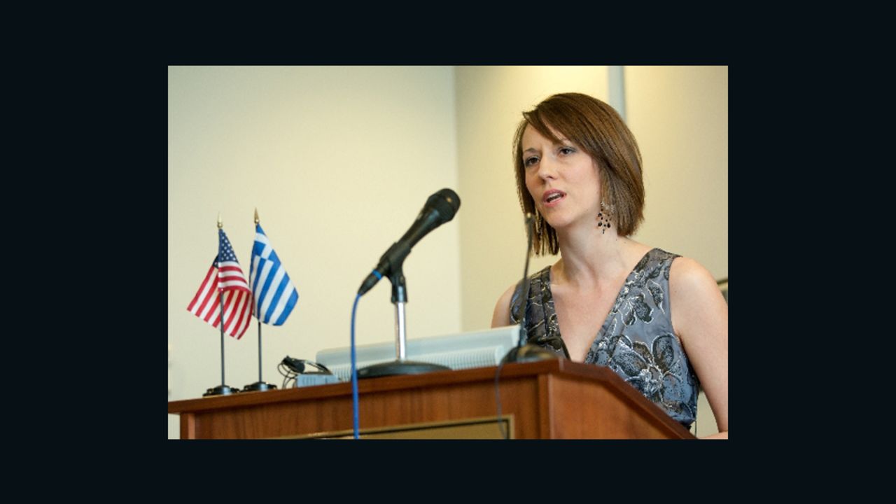 Elizabeth Gay, who donated her kidney to a stranger in Greece, speaks at a press conference.
