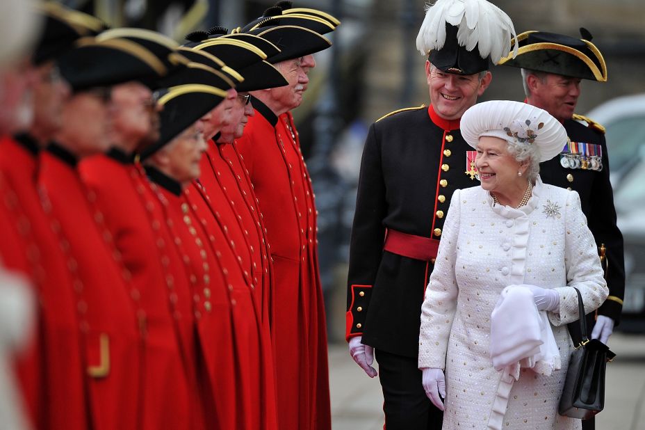 Queen Elizabeth II is greeted by Chelsea pensioners at Chelsea Pier ahead of the Thames River Pageant. This is the second time in British history a monarch has reached a diamond jubilee milestone. 
