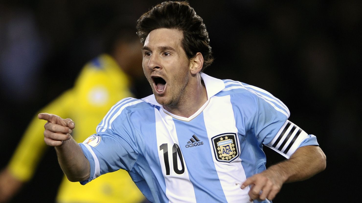 Lionel Messi celebrates after scoring Argentina's third goal against Ecuador at the Monumental stadium in Buenos Aires. 