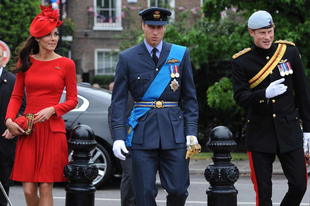 Prince William, his wife Catherine and Prince Harry prepare to board the royal barge "Spirit of Chartwell" during the Thames Diamond Jubilee Pageant on the River Thames in London on June 3, 2012.