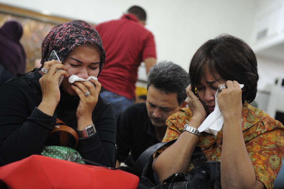 Indonesian relatives mourn at the airport in Jakarta after a Russian Sukhoi Superjet slammed into the side of a volcano on May 9, 2012. Russia's newest civilian airliner was on its second demonstration flight when the incident occurred, killing all 45 people on board.