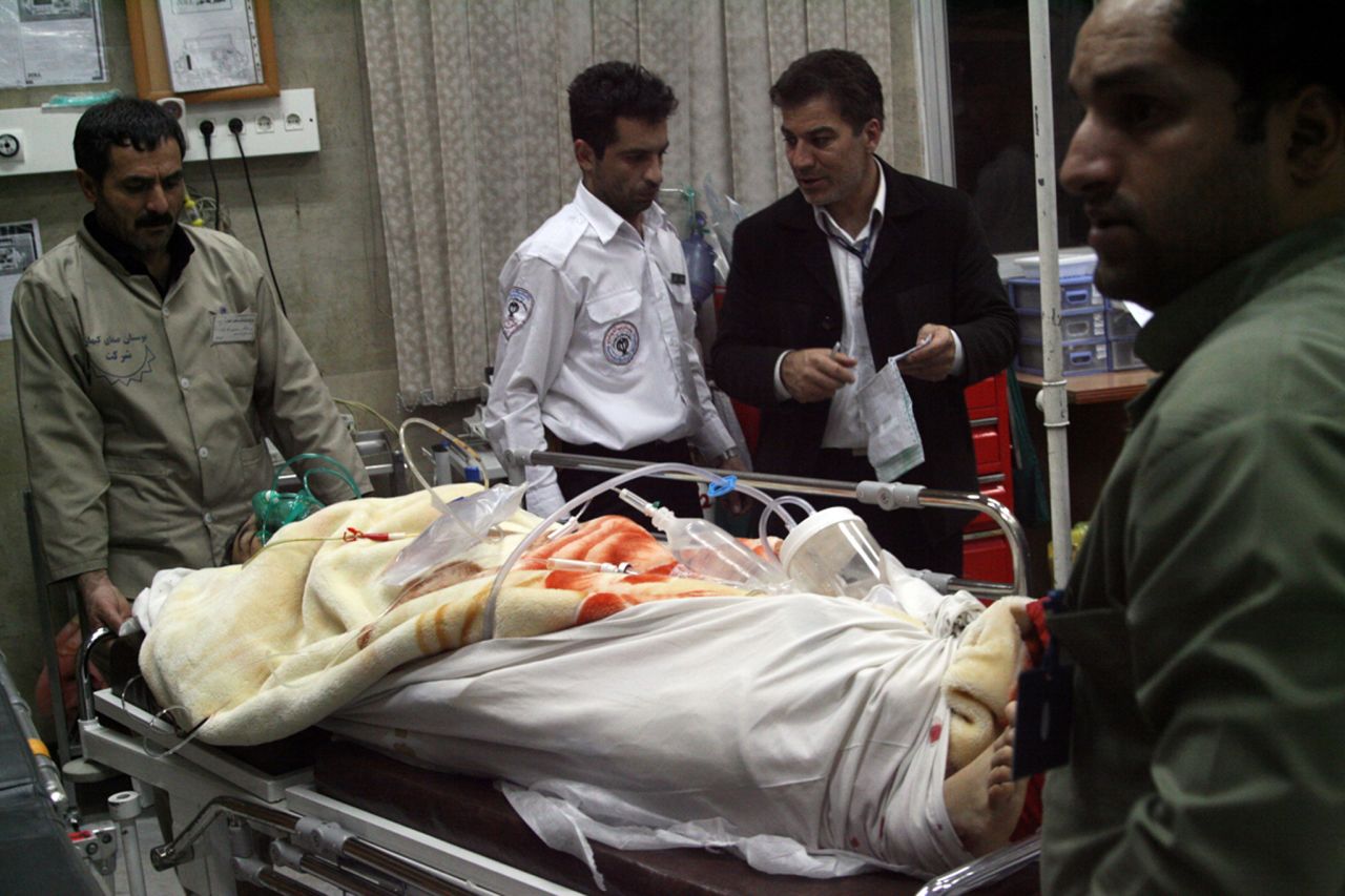 A survivor of an Iran Air Boeing 727 crash lies in a hospital on January 10, 2011. The plane went down a day earlier near the city of Orumiyeh, killing 77 of 105 passengers and crew members.