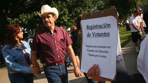 Democratic Party workers try to register new voters at a celebration marking Mexican Independence Day in September 2008. 