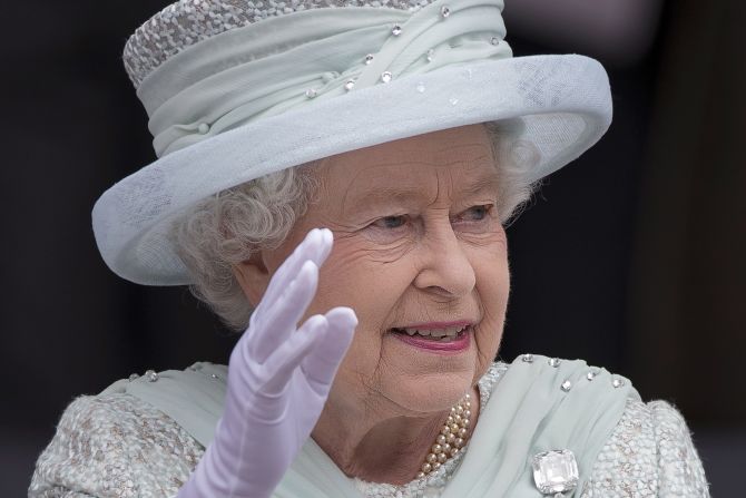 Queen Elizabeth II waves as she leaves St Paul's Cathedral. The queen wraps up four days of Diamond Jubilee celebrations with a thanksgiving service and ceremonial carriage procession in London.