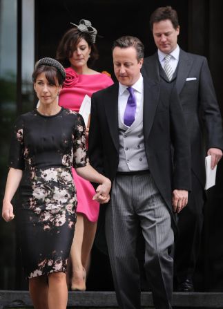 Britain's Prime Minister David Cameron, front right, and his wife Samantha Cameron, front left, and Deputy Prime Minister Nick Clegg and his wife Miriam Gonzales leave St Paul's Cathedral after a National Service of Thanksgiving to celebrate the Queen's Diamond Jubilee.