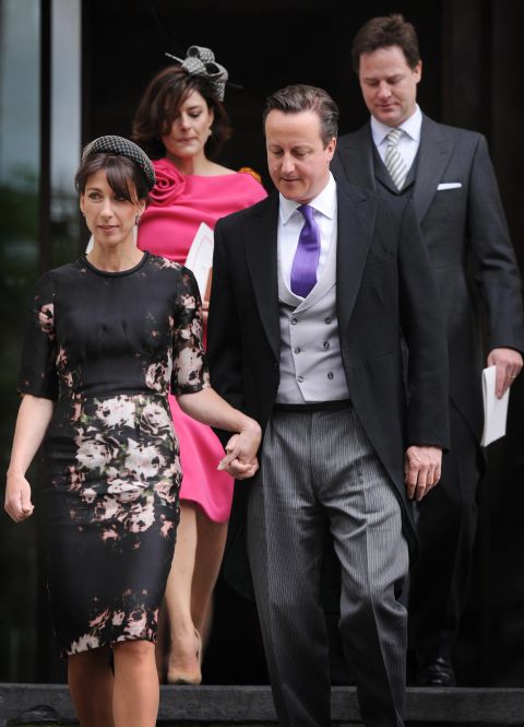 Britain's Prime Minister David Cameron, front right, and his wife Samantha Cameron, front left, and Deputy Prime Minister Nick Clegg and his wife Miriam Gonzales leave St Paul's Cathedral after a National Service of Thanksgiving to celebrate the Queen's Diamond Jubilee.