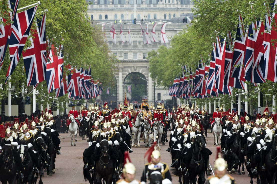 Horses ride down the Mall during the Diamond Jubilee Carriage Procession from Westminster Hall to Buckingham Palace in London on June 5, 2012. 