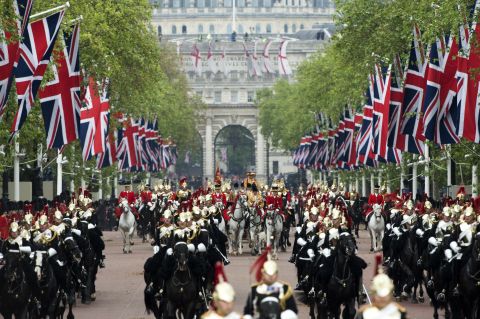 Horses ride down the Mall during the Diamond Jubilee Carriage Procession from Westminster Hall to Buckingham Palace.