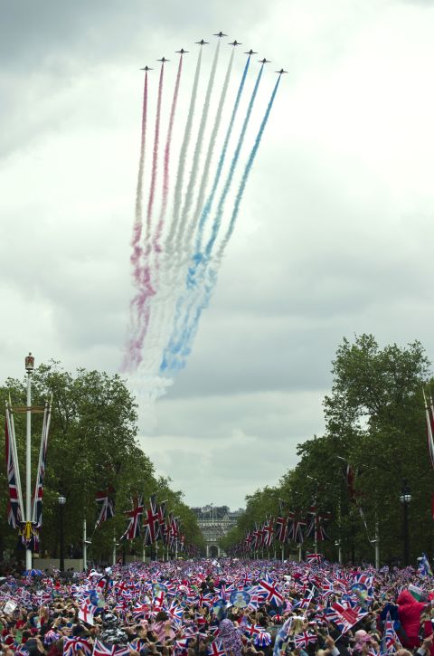 The Red Arrows fly over Buckingham Palace to celebrate the Queen's Diamond Jubilee in London on June 5, 2012. 