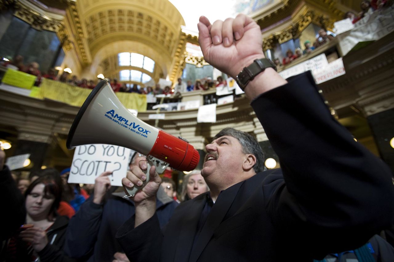 Richard Trumka, national AFL-CIO president, speaks to protesters in the capital rotunda during a rally in opposition to Walker's proposal.