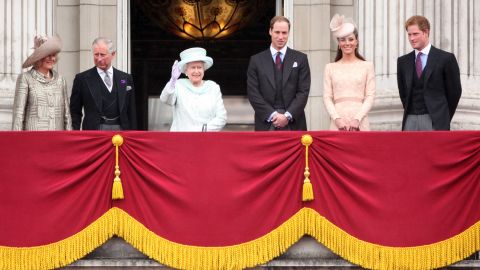 The British royal family wave to crowds from Buckingham Palace during Diamond Jubilee commemorations in 2012.