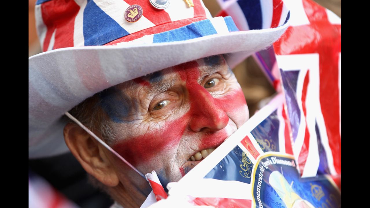 A man decked out in full Union Jack regailia celebrates the Diamond Jubilee.