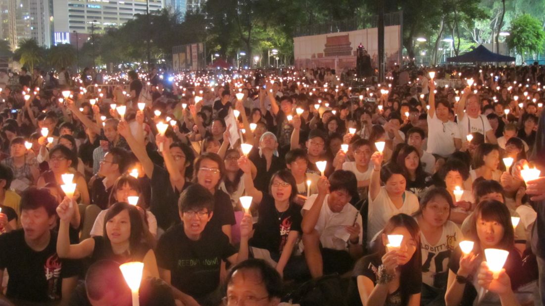 A sea of candles accompanies rallying cries of "Never forget June 4!", "Redress June 4!", "Persevere to the end!" at a candlelight vigil in Hong Kong to mark 23 years since the Tiananmen Square crackdown.