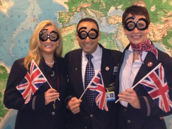  A group of American Airlines international flight attendants gather in London for the Thames Jubilee pageant on Sunday. Last year they attended the wedding of Prince William and Kate Middleton on the Mall. They told iReport: "This year we couldn't wait for the flotilla. It is was amazing and beautiful day, even in the rain."