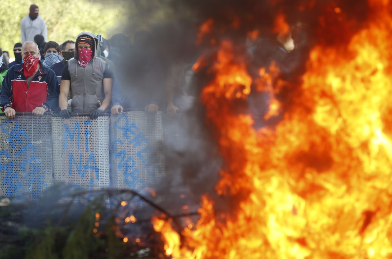 Spanish miners burn tires during an anti-austerity demonstration in Vega del Rey, near Oviedo, in northern Spain on June 4, 2012. 