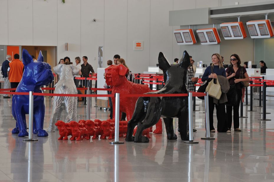 Sculptures by Belgian artist William Sweetlove are displayed at Carrasco airport in Montevideo as part of a temporary exhibition in November 2011.
