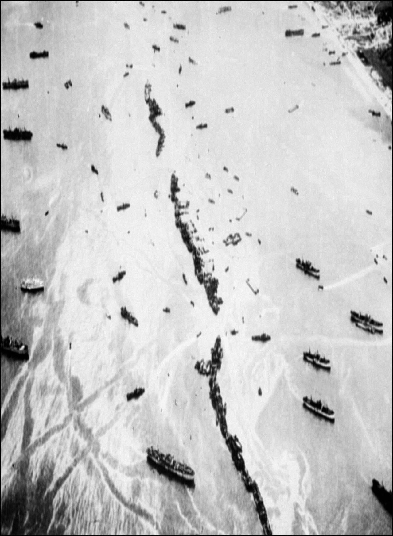 An aerial view shows 32 intentionally sunk American merchant ships that served as a breakwater as well as anti-aircraft platforms.