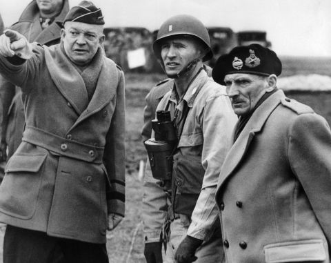 U.S. Gen. Dwight D. Eisenhower, left, supreme commander of the Allied forces, and British Field Marshal Bernard Montgomery, right, discuss plans at an undisclosed location in June 1944. The Allies went to elaborate lengths to maintain secrecy and mislead Adolf Hitler. They employed double agents and used decoy tanks and phony bases in England to hide actual troop movements.