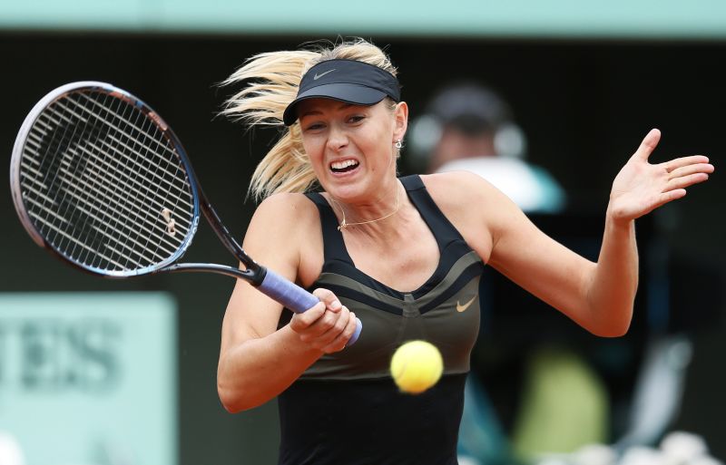 Sharapova brushes aside Kanepi to set up Kvitova clash | CNN