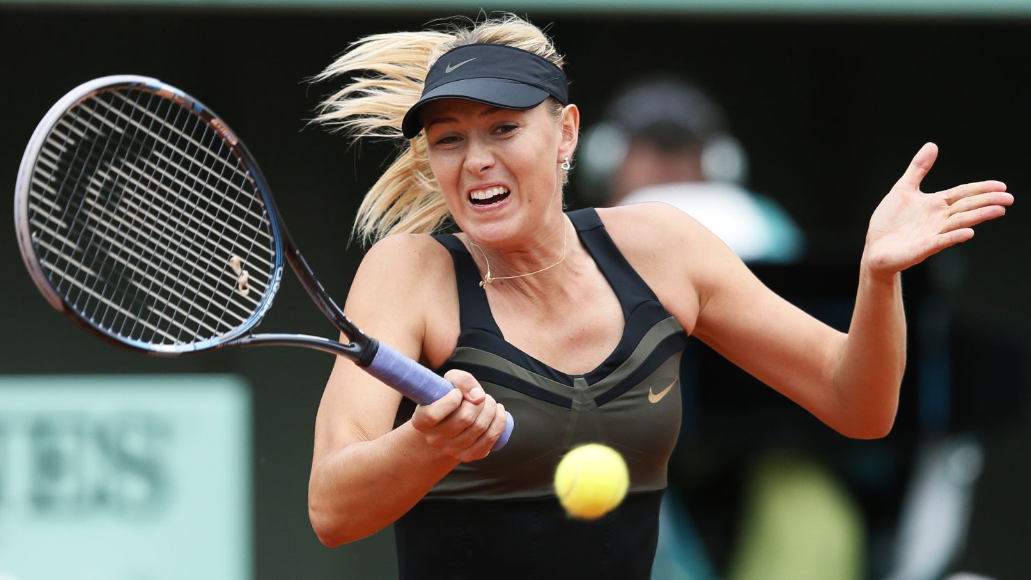Maria Sharapova needs two more victories to win the French Open title and complete a career grand slam