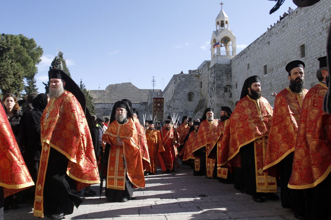 Orthodox priests take part in a procession in Bethlehem's Manger Square. Tourism officials in Bethlehem are hopeful that the upgrading of the Palestinian status at the U.N. could encourage more visitors to come.