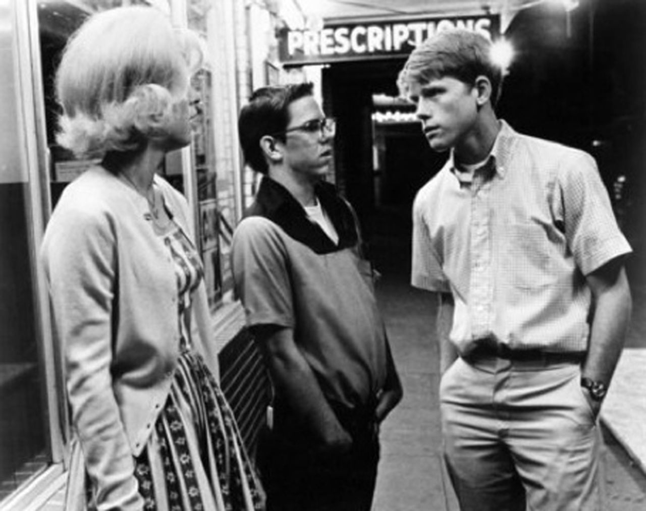 <strong>"American Graffiti" (1973)</strong>: Candy Clark, from left, Charles Martin Smith and Ron Howard appear in the nostalgic classic that focuses on a group of high school graduates who come together for one last night of cruising before they head off to college. 