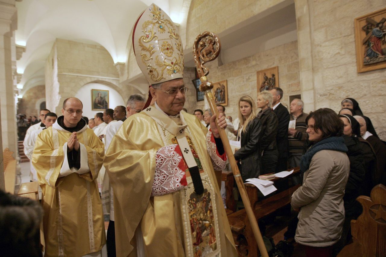 Latin Patriarch of Jerusalem Fouad Twal leading last year's Christmas midnight Mass at the church.
