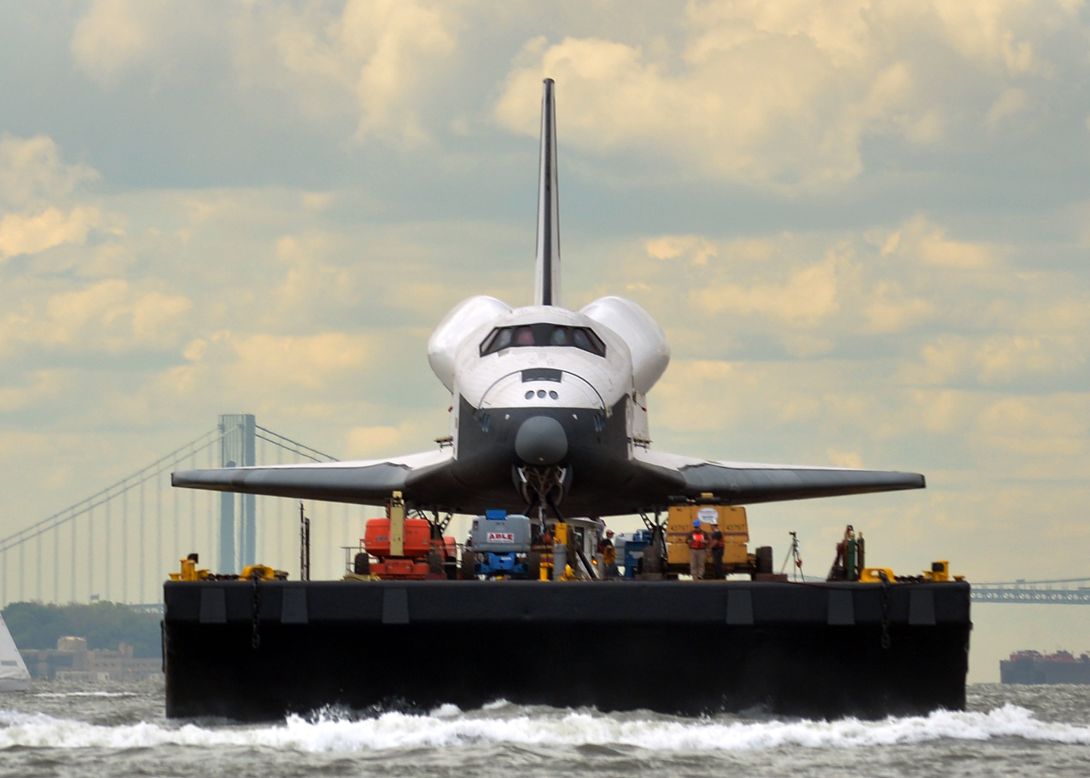 Enterprise floats head-on toward the Intrepid Sea.