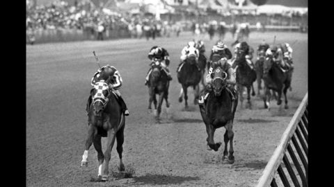 Secretariat, left, races toward a record win in the Kentucky Derby on May 5, 1973, at Churchill Downs in Louisville, Kentucky. 