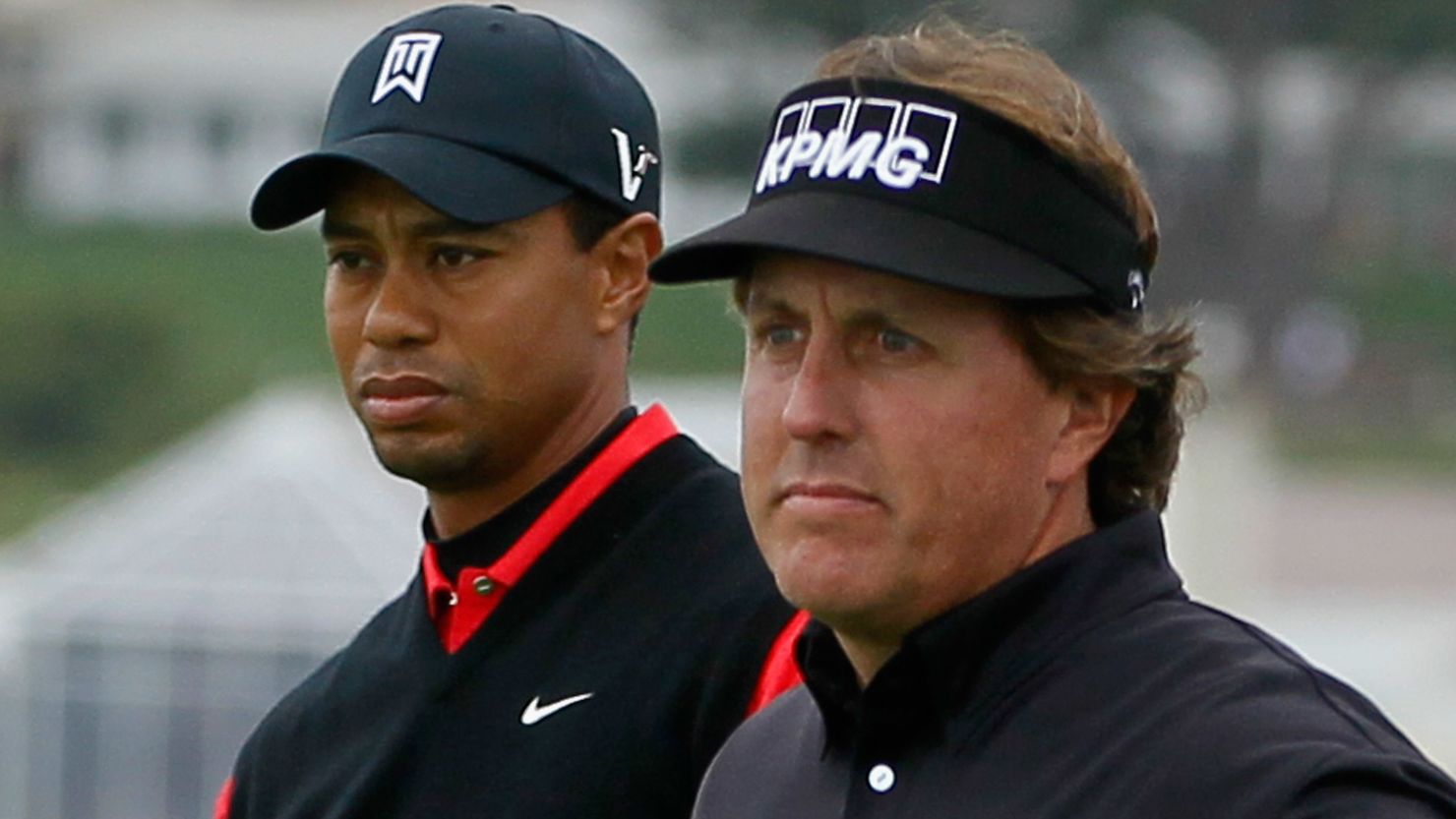 Tiger Woods, left, will play at a major with Phil Mickelson for the first time since the Masters in 2009.